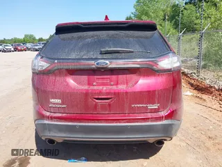 2015 Ford Edge Titanium z VIN 2FMTK3K97FBB06890, wystawiony jako IAAI lot #42241919 z przebiegiem 179 181 mil mil oraz . Historia ofert i sprzedaży dostępna na DreamBid. Obrazek 16.