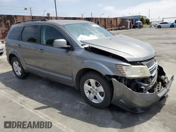 2012 Dodge Journey SXT with VIN 3C4PDCBG6CT207952, listed as a Copart auction lot 60334565 with Not provided miles and Salvage title. Bid and sale history available at DreamBid. Image 4.