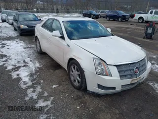 2009 Cadillac CTS AWD w/1SA with VIN 1G6DG577990169317, listed as a IAAI auction lot 41450158 with 144,768 mi miles. Bid and sale history available at carsss.com. Image 1.