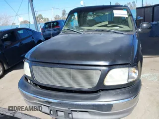 2002 Ford F-150 XL with VIN 1FTRX17WX2NB99454, listed as a IAAI auction lot 41643850 with 180,149 mi miles. Bid and sale history available at carsss.com. Image 12.