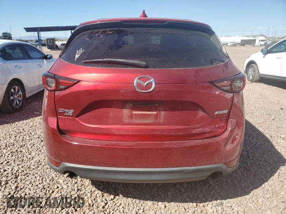 2017 Mazda CX-5 Grand Touring with VIN JM3KFBDL0H0118057, listed as a Copart auction lot 50121335 with 148,275 mi miles and Salvage Title. Bid and sale history available at carsss.com. Image 6.