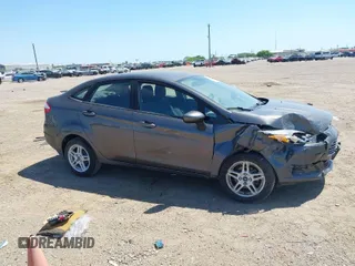 2018 Ford Fiesta SE with VIN 3FADP4BJ5JM144027, listed as a IAAI auction lot 41977656 with 34,217 mi miles. Bid and sale history available at carsss.com. Image 1.