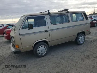 1987 Volkswagen Vanagon with VIN WV2YB0259HH100649, listed as a Copart auction lot 78259154 with 139,161 mi miles and Salvage Title. Bid and sale history available at DreamBid. Image 1.