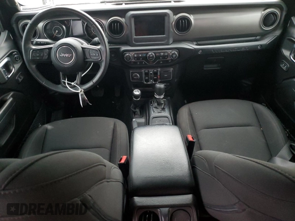 2023 Jeep Wrangler Sport S with VIN 1C4HJXDN1PW596242, listed as a Copart auction lot 82020314 with 30,061 mi miles and Salvage title. Bid and sale history available at DreamBid. Image 8.
