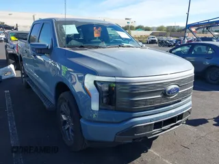 2023 Ford F-150 Lightning Pro with VIN 1FT6W1EVXPWG56541, listed as a IAAI auction lot 41345709 with 12,378 mi miles. Bid and sale history available at carsss.com. Image 1.