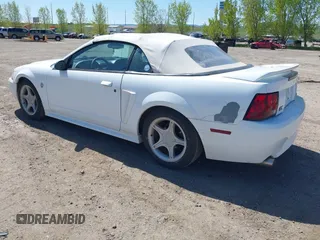 1999 Ford Mustang GT z VIN 1FAFP45X1XF215757, wystawiony jako IAAI lot #42311086 z przebiegiem 138 832 mil mil oraz . Historia ofert i sprzedaży dostępna na DreamBid. Obrazek 3.