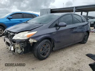 2015 Toyota Prius Four z VIN JTDKN3DU4F0410964, wystawiony jako Copart lot #59362255 z przebiegiem 239 594 mil mil oraz Czysty tytuł • Clean title. Historia ofert i sprzedaży dostępna na DreamBid. Obrazek 1.