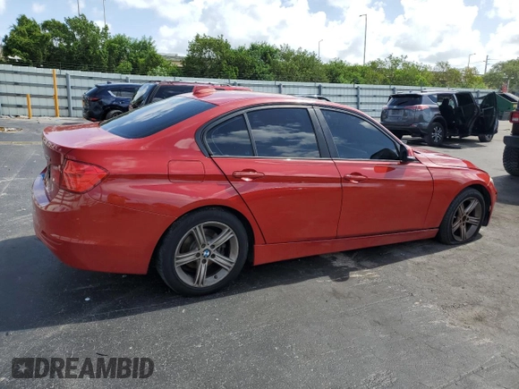 2013 BMW 3 Series 328i xDrive with VIN WBA3B3C5XDJ810958, listed as a Copart auction lot 60620005 with 143,589 mi miles and Salvage title. Bid and sale history available at DreamBid. Image 3.