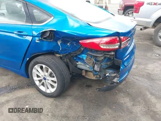 2020 Ford Fusion SE with VIN 3FA6P0HD8LR235608, listed as a IAAI auction lot 42099168 with 66,656 mi miles and . Bid and sale history available at DreamBid. Image 6.