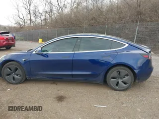 2018 Tesla Model 3 Long Range Battery with VIN 5YJ3E1EB2JF056166, listed as a IAAI auction lot 41847972 with 126,126 mi miles and . Bid and sale history available at DreamBid. Image 15.