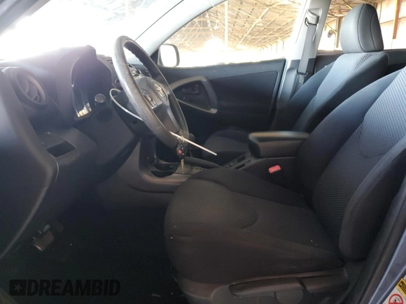 2009 Toyota RAV4 Sport with VIN JTMZF32V59D008178, listed as a Copart auction lot 62114395 with 136,944 mi miles and Salvage title. Bid and sale history available at DreamBid. Image 7.