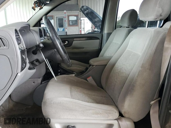 2005 GMC Envoy SLE z VIN 1GKDT13S552130173, wystawiony jako Copart lot #50766595 z przebiegiem Nie podano mil oraz Czysty tytuł • Clean title. Historia ofert i sprzedaży dostępna na DreamBid. Obrazek 7.