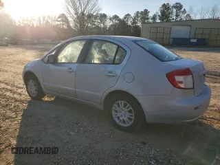 2012 Suzuki SX4 LE with VIN JS2YC5A38C6300439, listed as a Copart auction lot 85121124 with 74,324 mi miles and Clean Title. Bid and sale history available at carsss.com. Image 2.