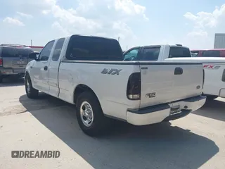2004 Ford F-150 XL with VIN 2FTRX17264CA69306, listed as a IAAI auction lot 41869054 with 247,183 mi miles and . Bid and sale history available at DreamBid. Image 3.
