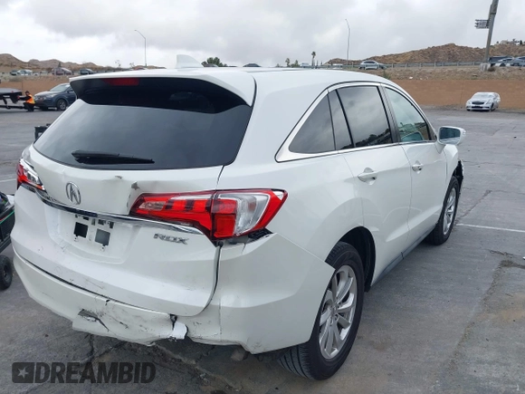2018 Acura RDX with VIN 5J8TB3H31JL012439, listed as a IAAI auction lot 41565530 with 63,909 mi miles and . Bid and sale history available at DreamBid. Image 4.