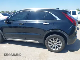 2019 Cadillac XT4 FWD Premium Luxury with VIN 1GYFZCR48KF141478, listed as a IAAI auction lot 41988092 with 53,970 mi miles and . Bid and sale history available at carsss.com. Image 14.