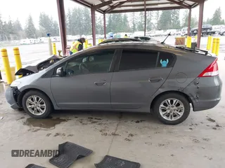 2010 Honda Insight EX with VIN JHMZE2H7XAS034098, listed as a IAAI auction lot 41939869 with 281,689 mi miles and . Bid and sale history available at DreamBid. Image 14.