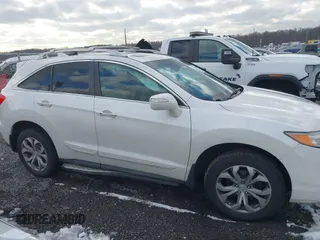 2015 Acura RDX Tech Pkg with VIN 5J8TB4H56FL000513, listed as a IAAI auction lot 41283811 with 167,324 mi miles. Bid and sale history available at carsss.com. Image 13.
