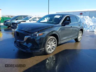 2023 Mazda CX-5 Signature with VIN JM3KFBXY2P0128644, listed as a IAAI auction lot 41753947 with 79,204 mi miles and . Bid and sale history available at carsss.com. Image 14.