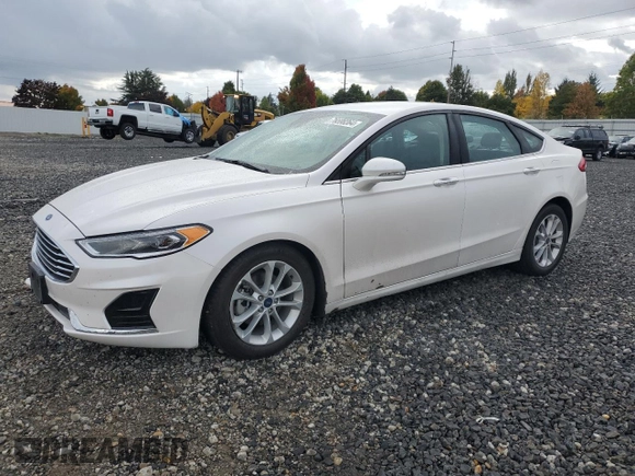 2020 Ford Fusion Hybrid SEL with VIN 3FA6P0MU8LR189560, listed as a Copart auction lot 76598364 with 57,443 mi miles and Salvage Title. Bid and sale history available at carsss.com. Image 1.