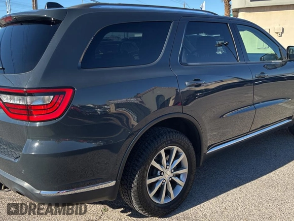 2018 Dodge Durango SXT with VIN 1C4RDJAG0JC111239, listed as a Copart auction lot 56432955 with 146,497 mi miles and Clean Title. Bid and sale history available at DreamBid. Image 4.