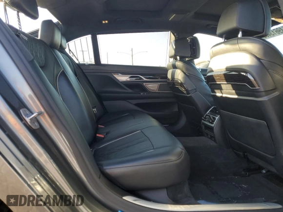 2017 BMW 7 Series 740i with VIN WBA7E2C32HG740988, listed as a Copart auction lot 49613465 with 63,646 mi miles and Salvage Title. Bid and sale history available at carsss.com. Image 10.