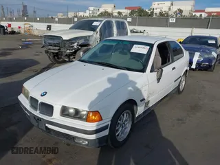 1996 BMW 3-Series 318TI with VIN WBACG8324TAU36317, listed as a IAAI auction lot 41489402 with 139,956 mi miles. Bid and sale history available at carsss.com. Image 2.