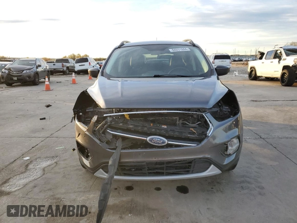 2017 Ford Escape SE with VIN 1FMCU0G91HUE07265, listed as a Copart auction lot 84231444 with 82,990 mi miles and Clean Title. Bid and sale history available at DreamBid. Image 5.