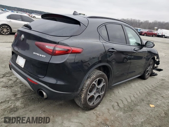 2018 Alfa Romeo Stelvio Sport z VIN ZASFAKPNXJ7B90958, wystawiony jako Copart lot #46043215 z przebiegiem Nie podano mil oraz Szkody całkowita. Historia ofert i sprzedaży dostępna na DreamBid. Obrazek 3.
