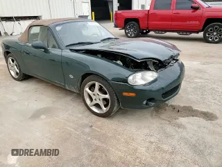 2001 Mazda MX-5 Miata z VIN JM1NB353810212392, wystawiony jako Copart lot #44398295 z przebiegiem 88 601 mil mil oraz Szkoda całkowita • Salvage title. Historia ofert i sprzedaży dostępna na DreamBid. Obrazek 10.