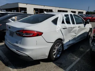 2019 Ford Fusion SE with VIN 3FA6P0HD8KR284242, listed as a Copart auction lot 53744275 with 44,341 mi miles and Salvage Title. Bid and sale history available at carsss.com. Image 3.