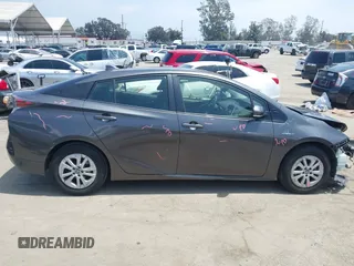 2017 Toyota Prius Two with VIN JTDKBRFU7H3570136, listed as a IAAI auction lot 42183403 with 112,828 mi miles and . Bid and sale history available at DreamBid. Image 14.
