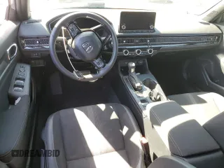 2025 Honda Civic Sport z VIN 2HGFE2F56SH502604, wystawiony jako Copart lot #49103395 z przebiegiem Nie podano mil oraz Szkoda całkowita • Salvage title. Historia ofert i sprzedaży dostępna na DreamBid. Obrazek 8.