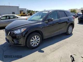 2016 Mazda CX-5 Sport with VIN JM3KE4BY5G0863575, listed as a Copart auction lot 63264725 with 76,588 mi miles and Salvage title. Bid and sale history available at DreamBid. Image 1.