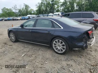2016 Audi A8 3.0T with VIN WAU34AFD9GN009551, listed as a Copart auction lot 56460955 with 70,246 mi miles and Salvage title. Bid and sale history available at DreamBid. Image 2.