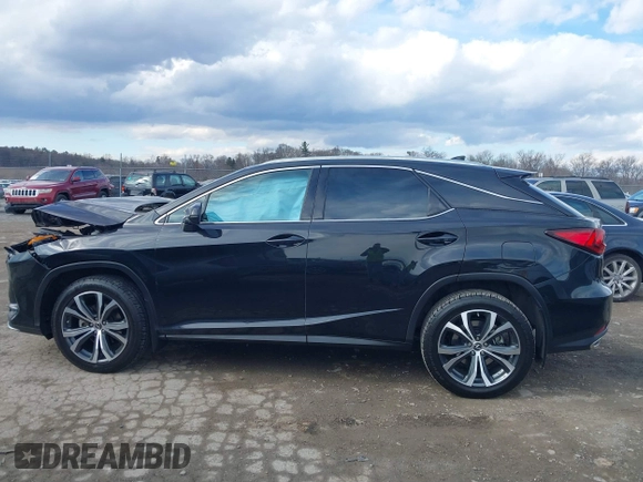 2022 Lexus RX with VIN 2T2HZMDA8NC328150, listed as a IAAI auction lot 41686701 with 42,987 mi miles. Bid and sale history available at carsss.com. Image 14.