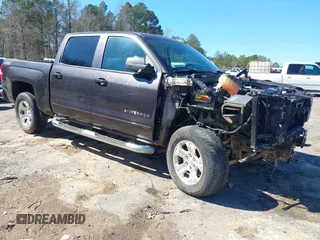 2015 Chevrolet Silverado 1500 LT with VIN 3GCUKREC4FG321983, listed as a IAAI auction lot 41642912 with 130,910 mi miles. Bid and sale history available at carsss.com. Image 1.
