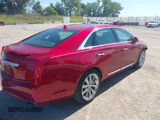 2014 Cadillac XTS Luxury with VIN 2G61M5S39E9143218, listed as a IAAI auction lot 42601268 with 37,172 mi miles and . Bid and sale history available at DreamBid. Image 4.