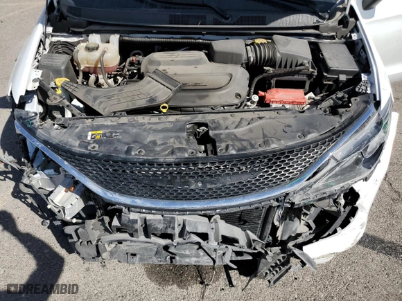 2021 Chrysler Voyager LXI with VIN 2C4RC1DGXMR551253, listed as a Copart auction lot 76611384 with 75,735 mi miles and Salvage Title. Bid and sale history available at carsss.com. Image 12.