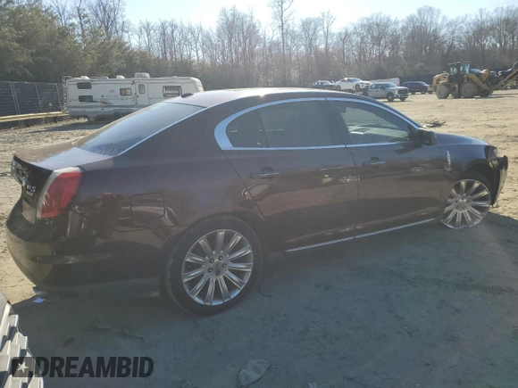 2012 Lincoln MKS with VIN 1LNHL9ER2CG802577, listed as a Copart auction lot 85455164 with 121,169 mi miles and Salvage Title. Bid and sale history available at DreamBid. Image 3.