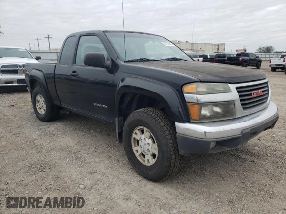 2005 GMC Canyon SLE Z71 with VIN 1GTDS196X58242957, listed as a Copart auction lot 87728635 with 206,977 mi miles and Salvage Title. Bid and sale history available at carsss.com. Image 4.