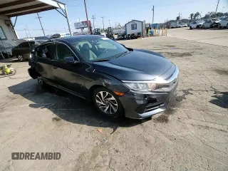 2016 Honda Civic EX with VIN 19XFC2F70GE214585, listed as a Copart auction lot 55607165 with 148,528 mi miles and Salvage Title. Bid and sale history available at DreamBid. Image 14.
