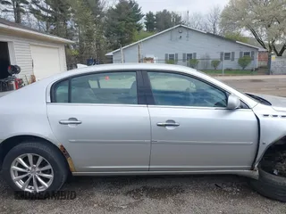 2009 Buick Lucerne CXL with VIN 1G4HD57M79U141033, listed as a IAAI auction lot 42061042 with 161,021 mi miles. Bid and sale history available at carsss.com. Image 14.