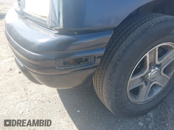 2002 Chevrolet Tracker LT z VIN 2CNBE634426952677, wystawiony jako IAAI lot #42009744 z przebiegiem 243 692 mil mil oraz . Historia ofert i sprzedaży dostępna na DreamBid. Obrazek 13.