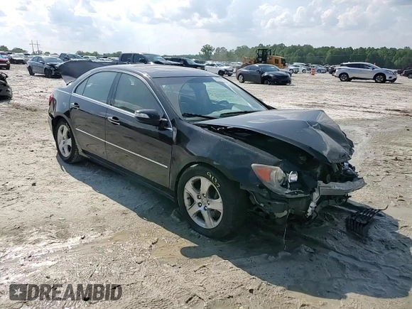 2005 Acura RL z VIN JH4KB16565C019863, wystawiony jako Copart lot #55317535 z przebiegiem 213 732 mil mil oraz Szkoda całkowita • Salvage title. Historia ofert i sprzedaży dostępna na DreamBid. Obrazek 13.