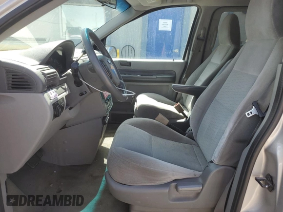 2005 Ford Freestar SE с VIN 2FMZA51655BA55923, выставлен на аукционе Copart как лот 50077735 с пробегом Не указан миль и Списание • Salvage title. История ставок и продаж доступна на DreamBid. Изображение 7.