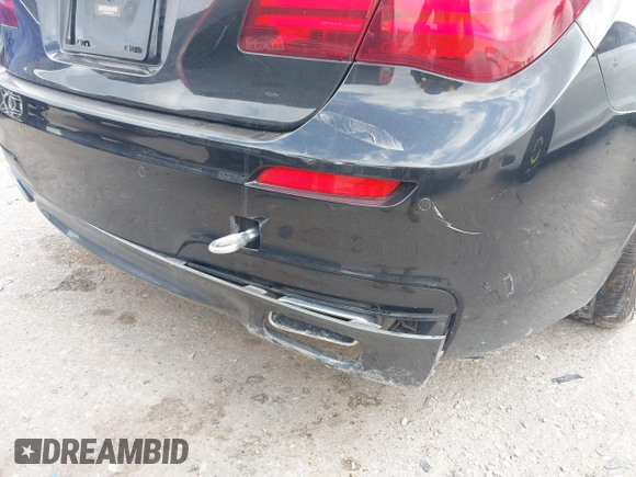 2013 BMW 7 Series 750Li with VIN WBAYE8C55DD133178, listed as a IAAI auction lot 41509860 with 90,841 mi miles and . Bid and sale history available at DreamBid. Image 6.