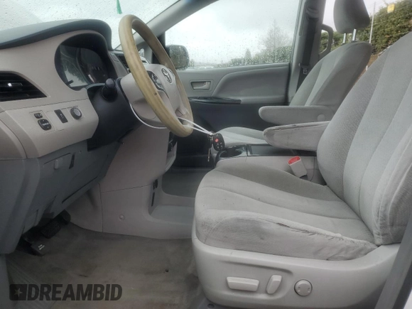 2014 Toyota Sienna LE with VIN 5TDJK3DC9ES092766, listed as a Copart auction lot 48005355 with 292,074 mi miles and Clean Title. Bid and sale history available at DreamBid. Image 7.