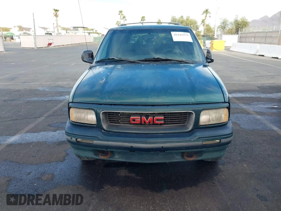 1997 GMC Jimmy SLS with VIN 1GKDT13W7V2516192, listed as a IAAI auction lot 41442979 with 154,518 mi miles. Bid and sale history available at carsss.com. Image 6.
