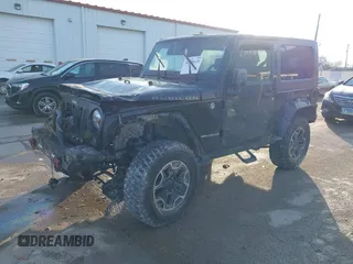 2009 Jeep Wrangler Rubicon with VIN 1J8GA641X9L706706, listed as a IAAI auction lot 41520129 with 176,345 mi miles. Bid and sale history available at carsss.com. Image 17.